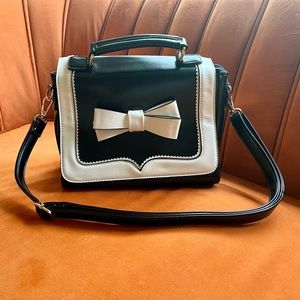 Royal Monk black and white bow tie handbag
